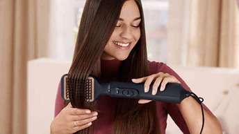 Четка за коса Philips Series 5000 BHA530/00, 1000W, за изправяне, 3 настройки за нагряване с 2 за скорост на вентилатора, 4x йонна технология, черна - характеристика 3